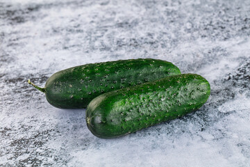 Ripe green raw two cucumbers