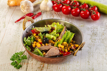 Dietary salad with canned tuna and corn