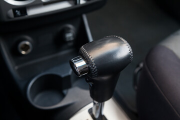 Automatic shift gear knob  leather in the passenger compartment of the car in black for driving and...