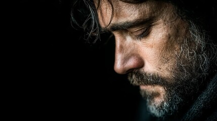 Obraz premium Portrait of a man experiencing mental suffering and emotional distress, expressing anxiety, sadness, and inner turmoil with a focused and realistic depiction of human emotion and psychological pain.