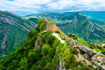 Stunning mountain landscape with photo tower of Russian fortress in Gunib. Dagestan, Caucasus