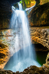Amazing underground Saltinsky waterfall in the Caucasus Mountains. Dagestan