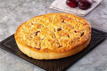 Sweet homemade pie with plums