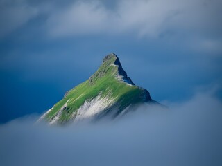 Green Mountain Peak Above Clouds grass rock