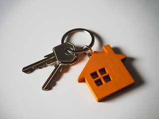 Silver keys with orange house keychain image