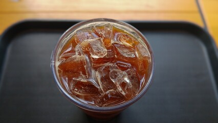 Iced Coffee Served in a Glass on a Cafe Table
