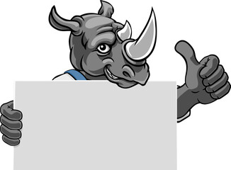 A rhino painter, handyman, mechanic, plumber or other construction cartoon mascot man in overall dungarees. Giving a thumbs up.