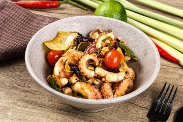 Roasted octopus with vegetables and oil