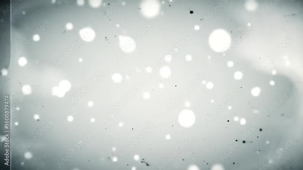 Poster abstract background with glowing particles, creating a soft, ethereal effect.