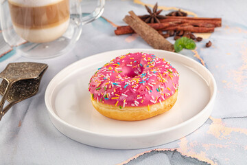 Sweet donut with strawberry icing