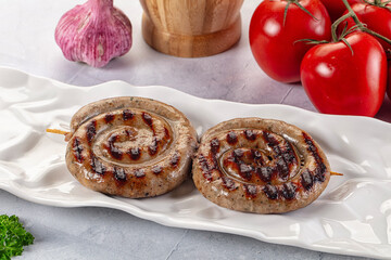 Grilled beef round circle sausages