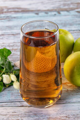 Apple yellow juice in the glass