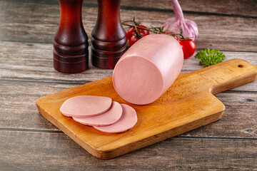 Boiled sausage with slices for breakfast