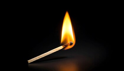 Matchstick flame against black background