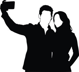 Silhouette of a couple taking a selfie with a mobile phone
