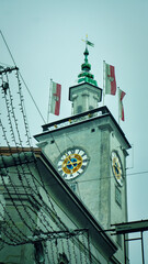 View of the town hall of Salzburg and of snowcapped rooftops in winter. Austria, Europe.