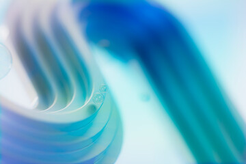 Futuristic 3D curves and flowing forms evoke data movement, fluidity, and digital energy