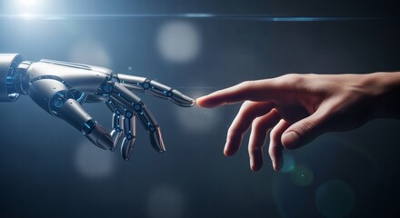 Naklejka premium A human hand reaches out to touch the finger of a metallic robot hand against a dark background with a bright light flare.