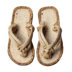 Close up of a pair of natural woven straw flip flops with fabric straps isolated on transparent background