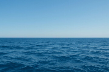 Vast blue ocean horizon under a clear sky