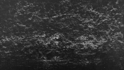 Abstract texture of rubbed chalk on a chalkboard. Chalkboard with white chalk stains for background or copy space for text and designs. Grunge white color chalk scratches on black board background.