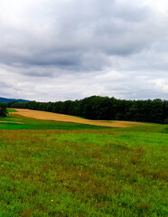 Dark clouds over field in Kashubia