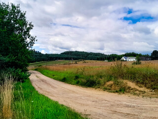 Incoming storm over country road in Kashubia.