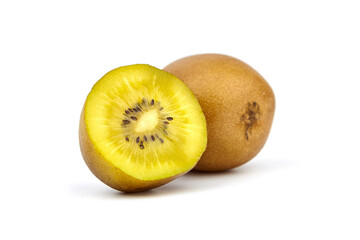 Fresh golden kiwi fruit, one whole and one sliced in half, showcasing vibrant yellow flesh and tiny...