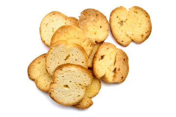Crispy golden-brown slices of toasted bread arranged artistically on a white background, showcasing texture and color, perfect for culinary presentations and food photography