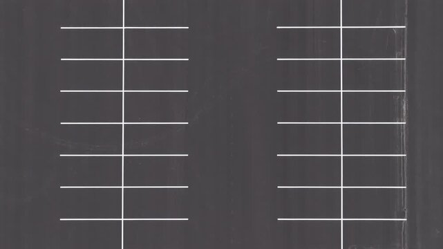 Overhead View of Clean, Vacant Asphalt Parking Rows