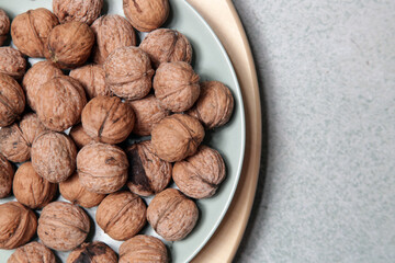Rustic image of dry walnuts in a bowl