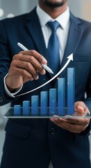 Business professional interacting with 3D graph on transparent tablet. Digital analytics and growth visualization.