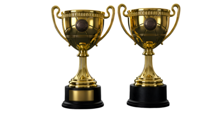 Two ornate golden champion cups with decorative handles on black bases, isolated on a white background.