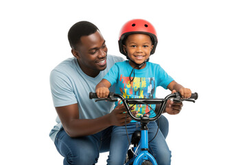 Joyful African American father teaching his son to ride a bicycle with a red helmet