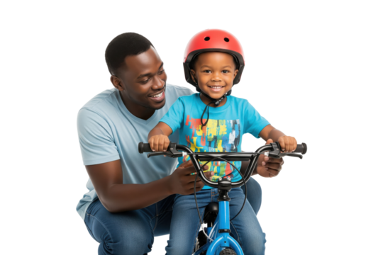 Joyful African American father teaching his son to ride a bicycle with a red helmet - Powered by Adobe