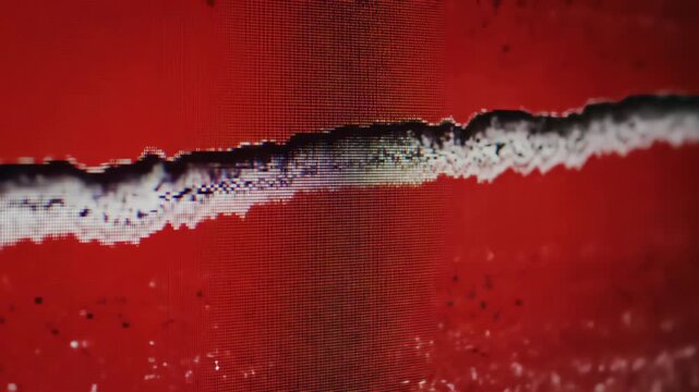 Close-up abstract of vibrant red texture with white streaks and pixelated effect, concept for futuristic backgrounds, digital glitch art and experimental video projects