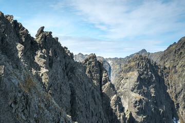 Mountain ridge, dangerous road between peaks.
