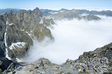 Clouds in the mountain valley, beautiful weather for climbing.
