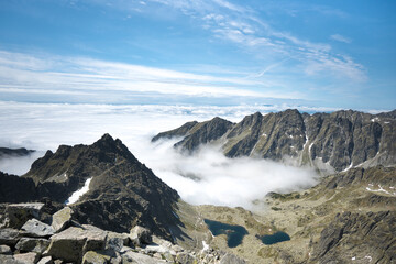 Clouds in the mountain valley, beautiful weather for climbing.
