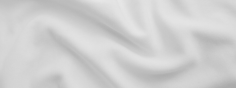 White wavy fabric background. Wrinkled cloth - Powered by Adobe