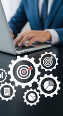 Business strategy concept with gear icons and laptop workspace. Technology and efficiency in corporate planning. Modern digital workflow with analytical tools.