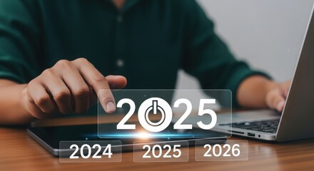 Futuristic technology interface with highlighted year 2025 and power symbol. Business professional planning future strategies. Modern workspace with digital progression themes.