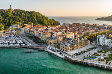 Fototapeta premium Aerial view of San Sebastian cityscape at sunrise in the Basque Country, northern Spain.