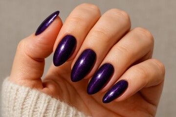 Elegant Purple Almond-Shaped Nails with Glossy Finish on Female Hand