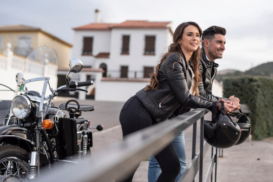Couple enjoy a nice day in a sidecar