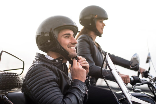 Couple enjoy a nice day in a sidecar