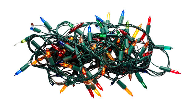 String of Christmas lights in tangled form, isolated on transparent background.