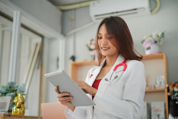 Bottom view of Female Veterinarian Smiling Using Digital Tablet