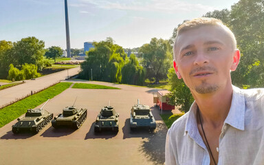 Man at military war tank tanks monument Brest Fortress Belarus.