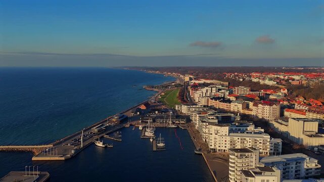 Scenic aerial view of Helsingborg coastline with promenade marina and residential buildings on a clear sunny day in southern Sweden 